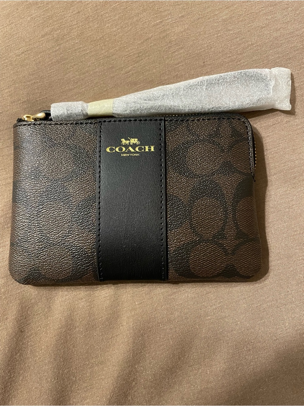 Coach Brown Signature Canvas Wristlet with Black Logo and Stripe